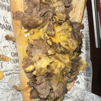 Charleys Cheesesteaks and Wings - Half of my Old School Cheesesteak Sandwich - Cheesesteaks Near Me - Kingman, Arizona Charleys Cheesesteaks and Wings - Half of my Old School Cheesesteak Sandwich - Cheesesteaks Near Me - Kingman, Arizona