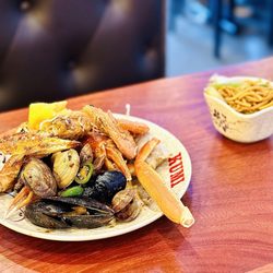 Kumi - Crab legs, mussels, and lo mein