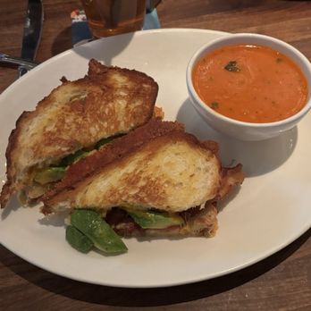 Yard House - My grilled cheese added bacon and avocado with tomato bisque - New American Near Me - Las Vegas, Nevada Yard House - My grilled cheese added bacon and avocado with tomato bisque - New American Near Me - Las Vegas, Nevada