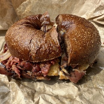 Brewed Awakenings - The Dadwich - hot pastrami, egg, cheese, grilled onions on pumpernickel bagel. - Coffee & Tea Near Me - Wells, Maine