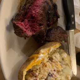8 oz ribeye and loaded baked potato 8 oz ribeye and loaded baked potato