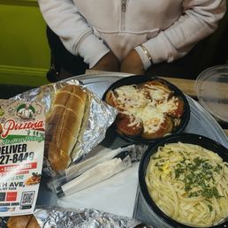 Fettuccine Alfredo, eggplant parmigiana w/spaghetti, and complementary loaf of garlic bread with any pasta!!