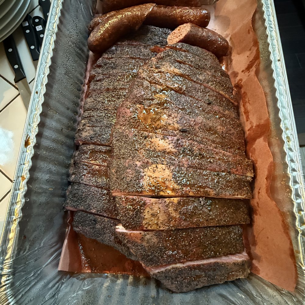 Belly Barbecue - 2 slabs of amazing ribs along with the tasty sausages. - Barbeque Near Me - Folsom, California Belly Barbecue - 2 slabs of amazing ribs along with the tasty sausages. - Barbeque Near Me - Folsom, California