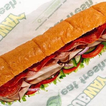 Subway - a sub sandwich on a wrapper - Fast Food Near Me - Newcastle, Washington