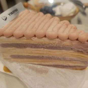 Yiko Yiko - Taro crepe cake ($12.50 before tax) - elegant layers but smaller in person than expecting - Bakeries Near Me - San Diego, California Yiko Yiko - Taro crepe cake ($12.50 before tax) - elegant layers but smaller in person than expecting - Bakeries Near Me - San Diego, California
