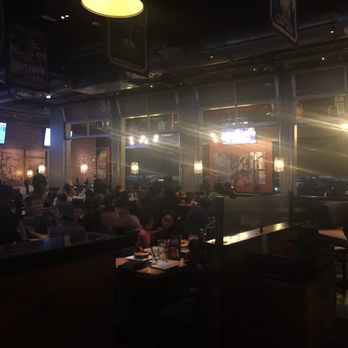 BJ's Restaurant & Brewhouse - Interior shot towards the tables. - New American Near Me - Valley Stream, New York