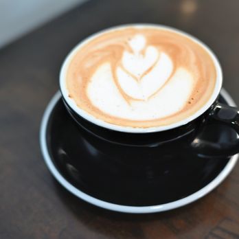 Backstory Coffee Roasters - a cappuccino on a saucer - Coffee Roasteries Near Me - Saint Paul, Minnesota