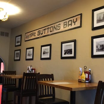 VI Grill - Old photos on display - Burgers Near Me - Suttons Bay, Michigan