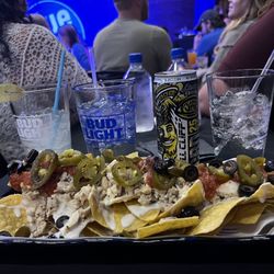 Chicken nachos, Jon Rogen drink, Tito's Moscow Mule and two Sprite's.