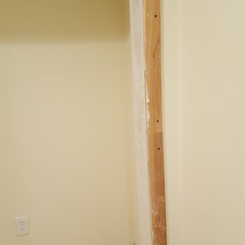 Mishas Home Improvement - a room with unfinished wood floors - General Contractors Near Me - Arnold, Maryland