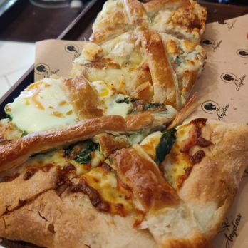 Angelina Bakery Times Square NYC - Spinach and egg plus 4 cheese focaccias. - Bakeries Near Me - New York, New York