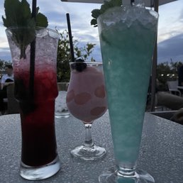 Drinks: mojito, frozen sangria and grapefruit drink Drinks: mojito, frozen sangria and grapefruit drink