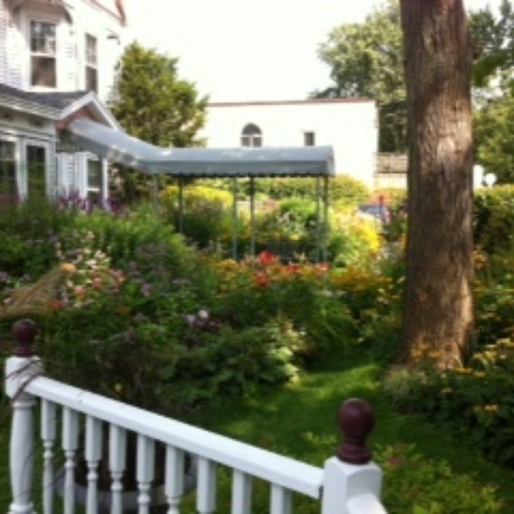 Yelton Manor Bed & Breakfast - View from patio of entrance of Guest House - Hotels Near Me - South Haven, Michigan Yelton Manor Bed & Breakfast - View from patio of entrance of Guest House - Hotels Near Me - South Haven, Michigan