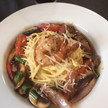 Puerto 511 - Huacaina spaghetti with shrimp and steak in lomo sauce - Peruvian Near Me - Baltimore, Maryland Puerto 511 - Huacaina spaghetti with shrimp and steak in lomo sauce - Peruvian Near Me - Baltimore, Maryland
