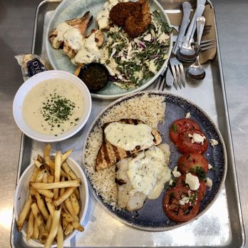California Fish Grill - From top: Shrimp Trio with Kaleslaw and Fries, New England Clam Chowder, Salmon & Swai Combo with Seasoned Tomato & Feta and White rice - Fish & Chips Near Me - Daly City, California