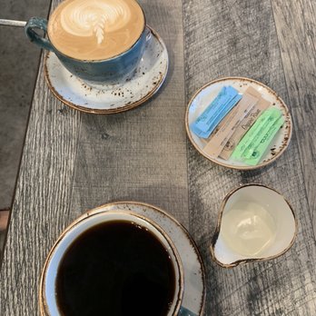 The Aussie Grind - Cappuccino and Mug of House Brew Coffee - Cafes Near Me - Frisco, Texas The Aussie Grind - Cappuccino and Mug of House Brew Coffee - Cafes Near Me - Frisco, Texas