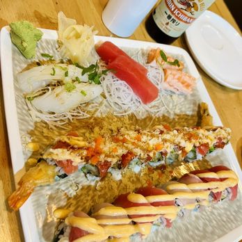 Koi Sushi - Squid Sashimi (top left) Tuna Sashimi (top middle) Smoked Salmon Sashimi (top right) Fire Island Sweetheart Heart Roll - Sushi Bars Near Me - Oviedo, Florida