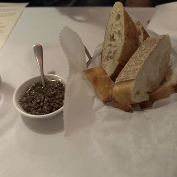 Il Corso - Bread, basket with little olive oil - Italian Near Me - New York, New York Il Corso - Bread, basket with little olive oil - Italian Near Me - New York, New York