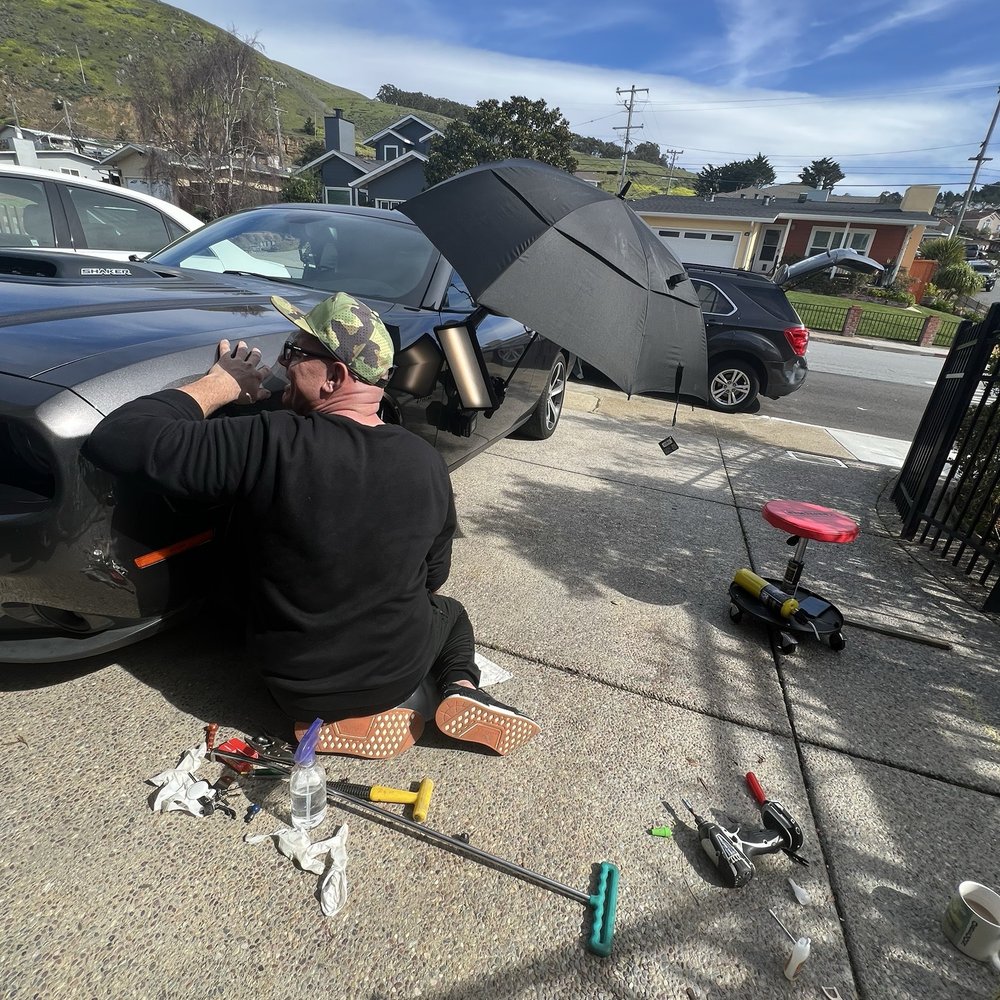 Redline Paintless Dent Repair - Jacob completing the job quickly in my driveway- Convenient and professional. - Mobile Dent Repair Near Me Redline Paintless Dent Repair - Jacob completing the job quickly in my driveway- Convenient and professional. - Mobile Dent Repair Near Me