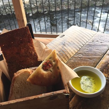 Foundry Kitchen and Tavern - The delicious bread with the oil and garlic spread ! - New American Near Me - Sandy Hook, Connecticut Foundry Kitchen and Tavern - The delicious bread with the oil and garlic spread ! - New American Near Me - Sandy Hook, Connecticut