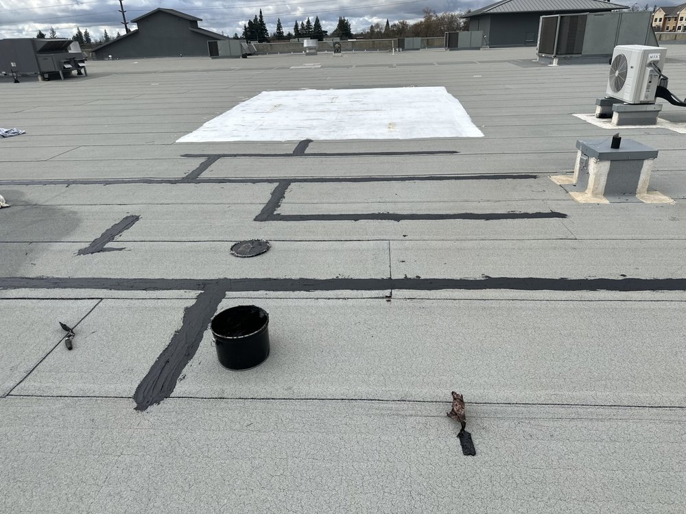 Slide of New Era Roofing