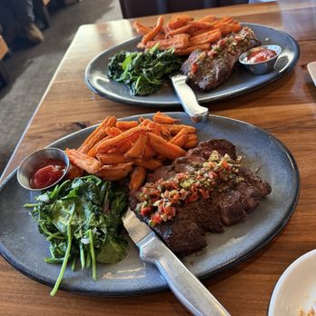 Burtons Grill & Bar - Steak Frites, Sweet Potato Fries, Spinach - New American Near Me - Riverdale Park, Maryland