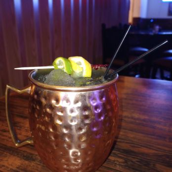 Safire Restaurant - a moscow mule with lime and strawberries - American Near Me - Springerville, Arizona Safire Restaurant - a moscow mule with lime and strawberries - American Near Me - Springerville, Arizona