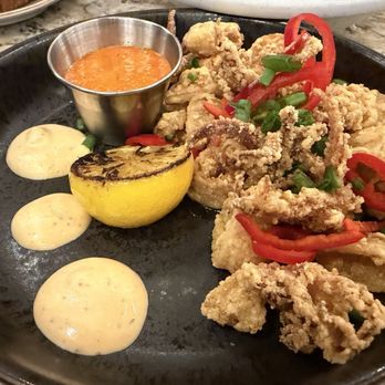Spice Road Table - Calamari - with Harissa Rémoulade - Tapas Bars Near Me - Orlando, Florida Spice Road Table - Calamari - with Harissa Rémoulade - Tapas Bars Near Me - Orlando, Florida