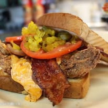 Mason-Dixon Cafe - Enjoy the Mason Dixon Cafe Mother Clucker sandwich, featuring crispy fried chicken, bacon, eggs, peppers, and fresh toppings ... - Breakfast & Brunch Near Me - Fredericksburg, Virginia Mason-Dixon Cafe - Enjoy the Mason Dixon Cafe Mother Clucker sandwich, featuring crispy fried chicken, bacon, eggs, peppers, and fresh toppings ... - Breakfast & Brunch Near Me - Fredericksburg, Virginia