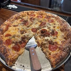 Modern Sports Restaurant - Meat lovers pizza