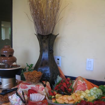Top Hat Catering - Decadent Chocolate Fountain with a variety of goodies for dipping. - Caterers Near Me - Lemon Grove, California
