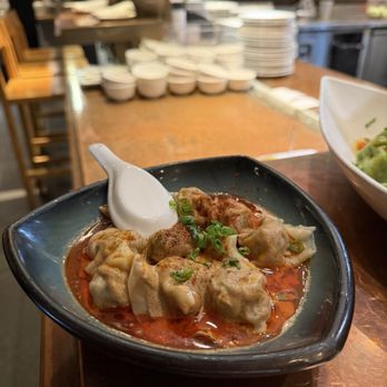 China Live - Sichuan "Working Hands" Pork Dumplings, Sesame Butter, Peppercorn-Chili Broth (10) - Chinese Near Me - San Francisco, California China Live - Sichuan "Working Hands" Pork Dumplings, Sesame Butter, Peppercorn-Chili Broth (10) - Chinese Near Me - San Francisco, California