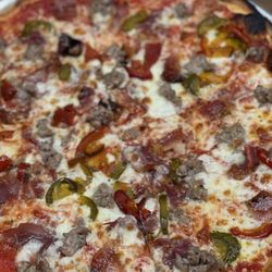 Doma On Main - Pizza/ Sausage, pepperoni, cherry peppers.