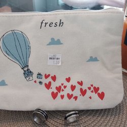 Peddlers Market - Adorable small cloth zipper bags with cute designs for a doller each.