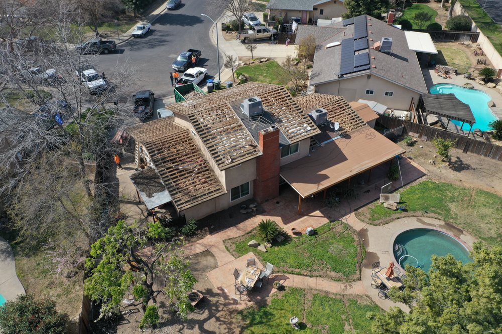 Slide of Roof Pros Roofing