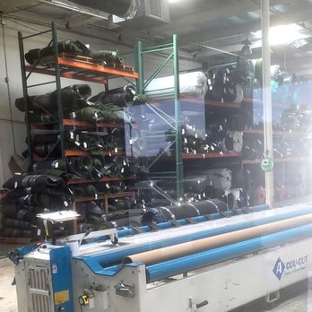 Synthetic Grass Store - a conveyor belt in a warehouse - Artificial Turf Near Me - Anaheim, California Synthetic Grass Store - a conveyor belt in a warehouse - Artificial Turf Near Me - Anaheim, California