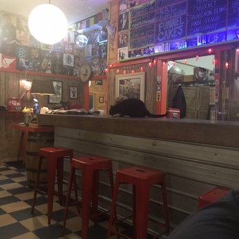 Samurai Soul Food - Cat having dinner on the bar - Soul Food Near Me - Fairlee, Vermont