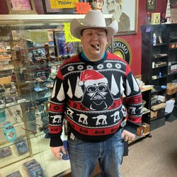 Seguin Cigar - Our resident police officer, Tyler, dressed in his snazzy Darth Vader Christmas sweater.