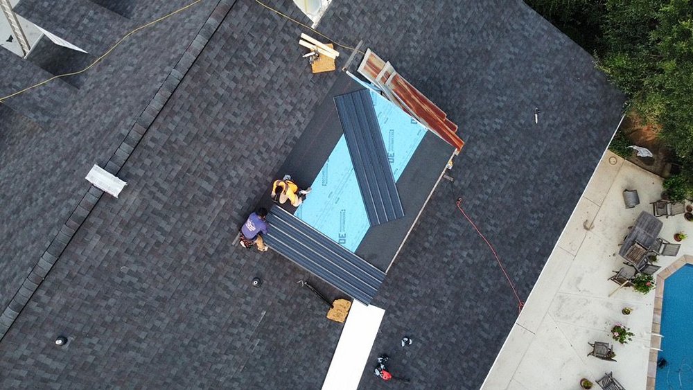 Slide of Denali Roofing and Restorations