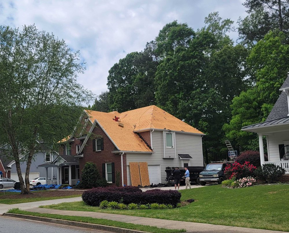 Slide of Rivertop Roofing