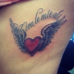 First tattoo. It was done by Kelly. The saying is in Italian which translates to "I fly with my own wings". First tattoo. It was done by Kelly. The saying is in Italian which translates to "I fly with my own wings".