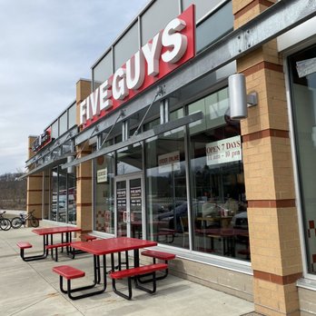 Five Guys - The outside of the Bridgeville Five Guys. Little bit of outdoor seating available for nicer weather. - Fast Food Near Me - Bridgeville, Pennsylvania Five Guys - The outside of the Bridgeville Five Guys. Little bit of outdoor seating available for nicer weather. - Fast Food Near Me - Bridgeville, Pennsylvania