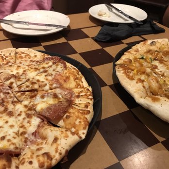 Stormcloud Brewing - Traditional pepperoni pizza and a twist on a shrimp Thai pizza - Brewpubs Near Me - Frankfort, Michigan Stormcloud Brewing - Traditional pepperoni pizza and a twist on a shrimp Thai pizza - Brewpubs Near Me - Frankfort, Michigan