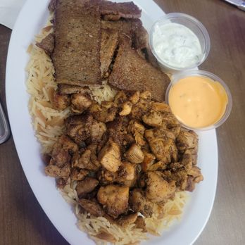 Yanni's Greek Grill - Meat Plate comes with two sides (rice below meats was a side serving, very generous) - Greek Near Me - Las Vegas, Nevada Yanni's Greek Grill - Meat Plate comes with two sides (rice below meats was a side serving, very generous) - Greek Near Me - Las Vegas, Nevada