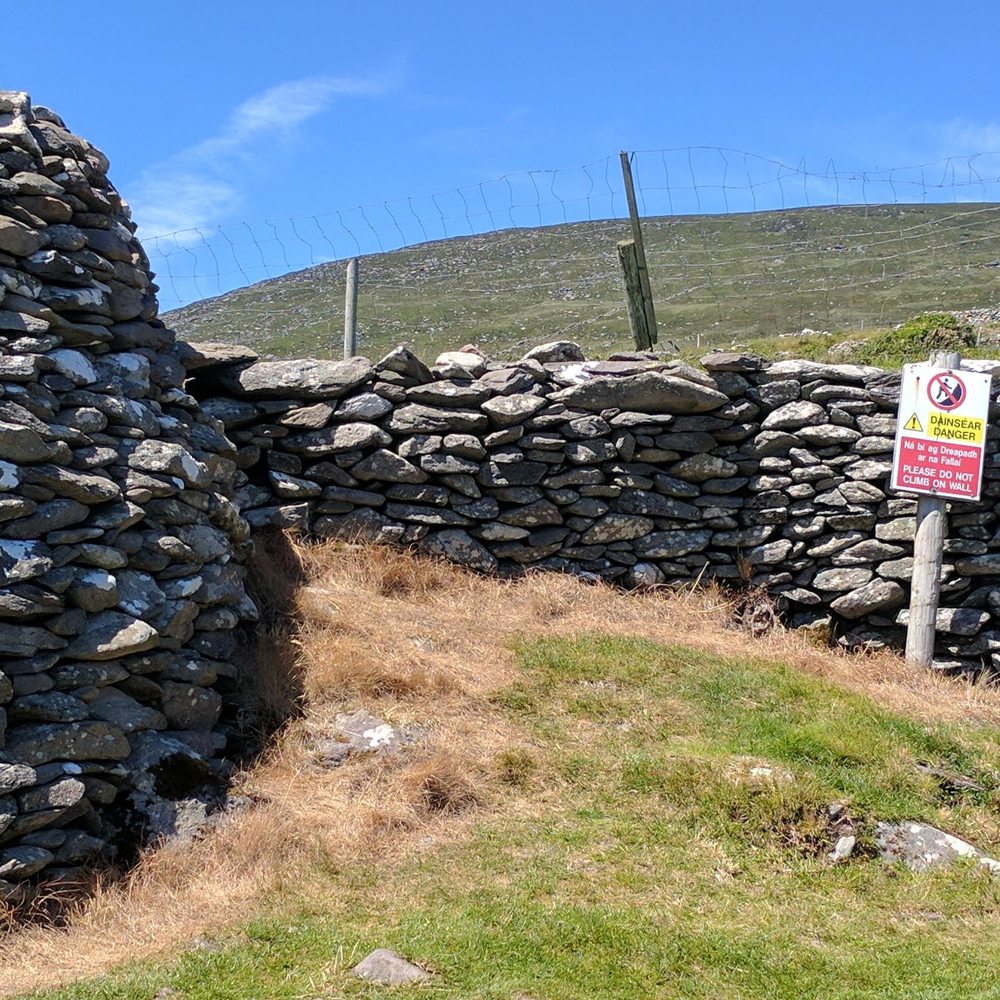 Fahan Beehive Huts - Wall at Fahan clocháin (Beehive Huts) - Landmarks & Historical Buildings Near Me - Dingle, Kentucky