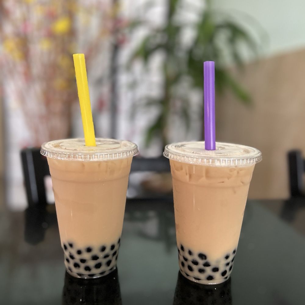 Two fresh milk tea boba drinks Two fresh milk tea boba drinks