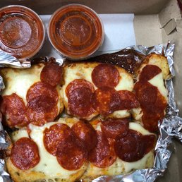 Garlic bread with cheese and pepperoni Garlic bread with cheese and pepperoni