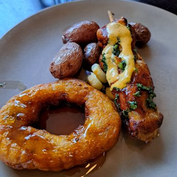 Tanta - Sweet potato donut with sweet sauce and grilled chicken with tiny potatoes - Peruvian Near Me - Chicago, Illinois Tanta - Sweet potato donut with sweet sauce and grilled chicken with tiny potatoes - Peruvian Near Me - Chicago, Illinois