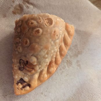 Cocos Empanadas - They have cool little stamps that tell you which empanada it is. - Empanadas Near Me - Brooklyn, New York Cocos Empanadas - They have cool little stamps that tell you which empanada it is. - Empanadas Near Me - Brooklyn, New York