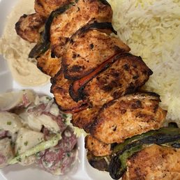 Chicken Kabob Plate with basmati rice, hummus, and Mediterranean potato salad. Chicken Kabob Plate with basmati rice, hummus, and Mediterranean potato salad.